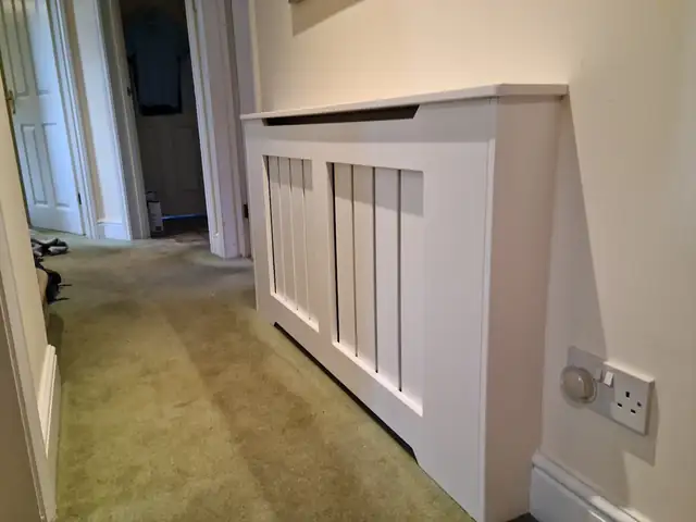 White painted radiator cover